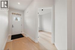 Entrance foyer featuring baseboards and recessed lighting - 