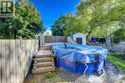 Fully Fenced Yard with Above Ground Pool - 