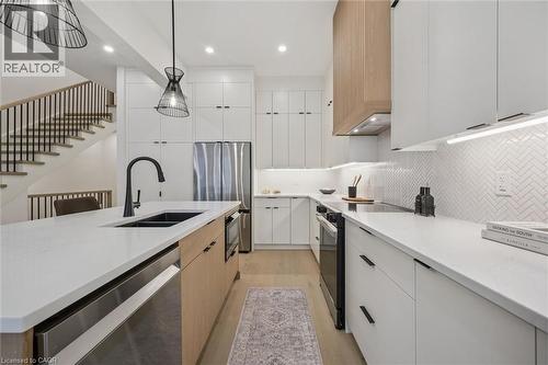 Open-concept kitchen, living room & dinette with large windows & 10' ceilings - 548 Peach Blossom Court, Kitchener, ON - Indoor Photo Showing Kitchen With Double Sink With Upgraded Kitchen