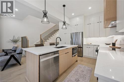 Open-concept kitchen, living room & dinette with large windows & 10' ceilings - 548 Peach Blossom Court, Kitchener, ON - Indoor Photo Showing Kitchen With Double Sink With Upgraded Kitchen