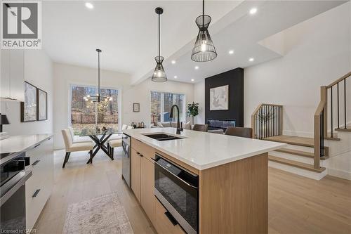 Open-concept kitchen, living room & dinette with large windows & 10' ceilings - 548 Peach Blossom Court, Kitchener, ON - Indoor Photo Showing Kitchen With Double Sink With Upgraded Kitchen