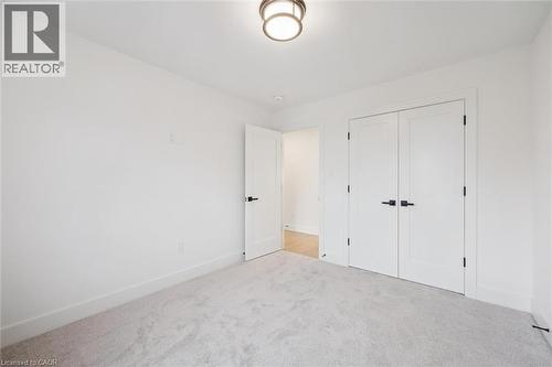 Secondary Bedroom - 548 Peach Blossom Court, Kitchener, ON - Indoor Photo Showing Other Room