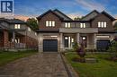 Semi-detached home with a 1-car garage and paver stone driveway & walkway - 548 Peach Blossom Court, Kitchener, ON  - Outdoor With Facade 
