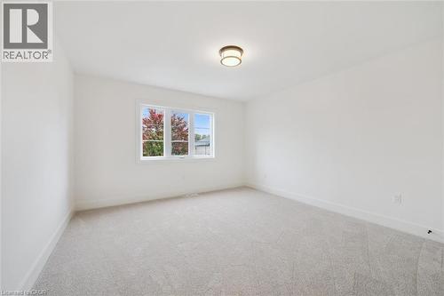 Secondary Bedroom - 548 Peach Blossom Court, Kitchener, ON - Indoor Photo Showing Other Room