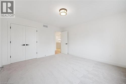 Secondary Bedroom - 548 Peach Blossom Court, Kitchener, ON - Indoor Photo Showing Other Room