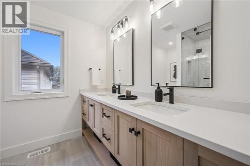 4-pc ensuite with a spacious tile & glass shower & white oak vanity - 548 Peach Blossom Court, Kitchener, ON - Indoor Photo Showing Bathroom