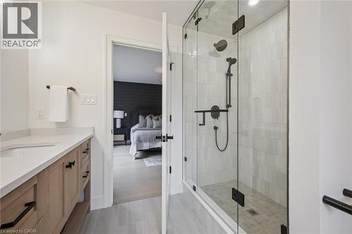 4-pc ensuite with a spacious tile & glass shower & white oak vanity - 548 Peach Blossom Court, Kitchener, ON - Indoor Photo Showing Bathroom