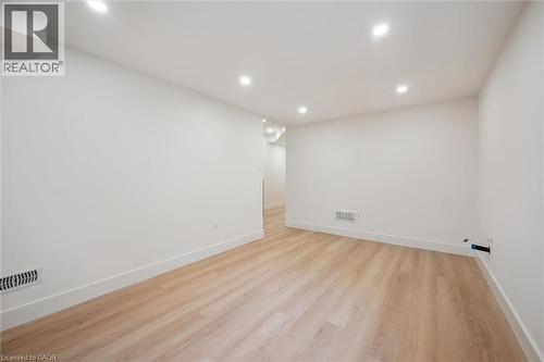 Lower level rec room with a rough-in for a wet bar - 548 Peach Blossom Court, Kitchener, ON - Indoor Photo Showing Other Room