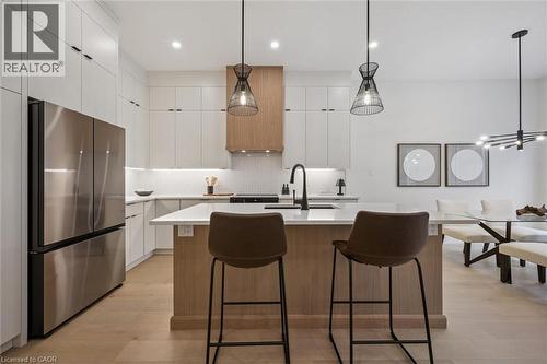 Open-concept kitchen, living room & dinette with large windows & 10' ceilings - 548 Peach Blossom Court, Kitchener, ON - Indoor Photo Showing Kitchen With Upgraded Kitchen