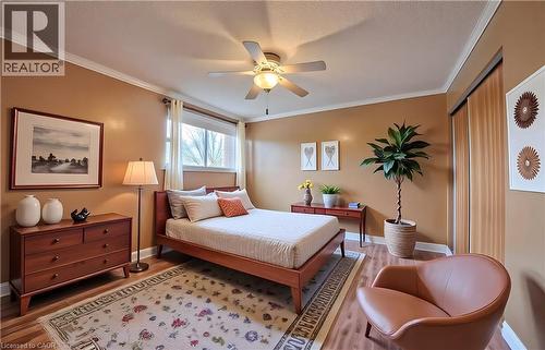 Virtually Staged - 400 Champlain Boulevard Unit# 406, Cambridge, ON - Indoor Photo Showing Bedroom