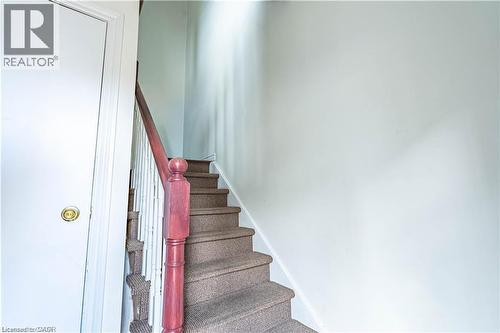 Stairs featuring baseboards - 10 Main Street, Mississauga, ON 