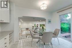 Dining room featuring light tile patterned flooring - 