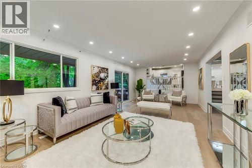 Living room with light wood-style flooring, recessed lighting, and plenty of natural light - 170 Cavendish Court, Oakville, ON - Indoor Photo Showing Living Room