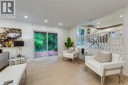 Sitting room featuring recessed lighting and light wood finished floors - 