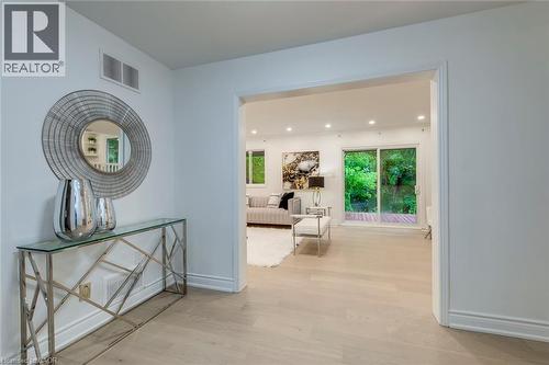 Hall with light wood finished floors and recessed lighting - 170 Cavendish Court, Oakville, ON - Indoor Photo Showing Other Room