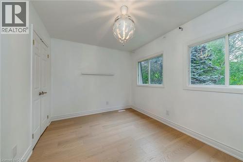 Unfurnished bedroom with light wood-style flooring and a closet - 170 Cavendish Court, Oakville, ON - Indoor Photo Showing Other Room