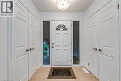 Foyer with light wood finished floors - 