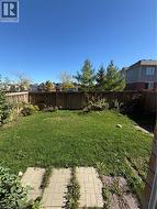View of fenced backyard - 