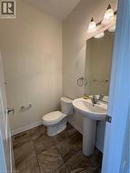 Bathroom with baseboards and toilet - 