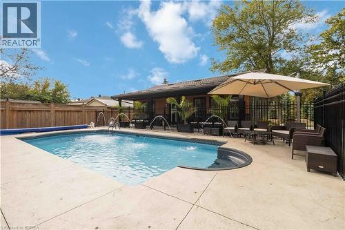 232 Paris Road E, Brantford, ON - Outdoor With In Ground Pool With Backyard