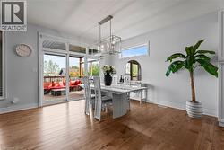 Dining room featuring hardwood / wood-style floors - 