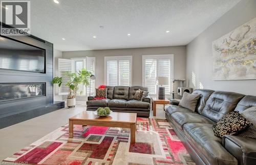 43 Greyhawk Street, Kitchener, ON - Indoor Photo Showing Living Room With Fireplace