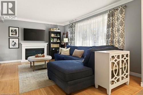 7 Prince Charles Drive, St. Catharines, ON - Indoor Photo Showing Living Room With Fireplace