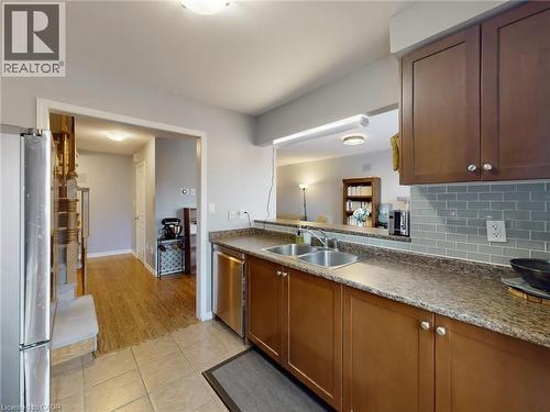 597 Speyer Circle, Milton, ON - Indoor Photo Showing Kitchen With Double Sink