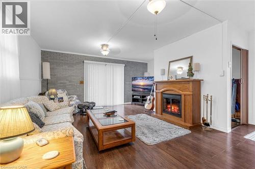 143 Walter Avenue S, Hamilton, ON - Indoor Photo Showing Living Room With Fireplace