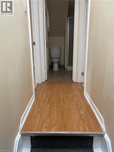 Corridor featuring light wood-style floors and baseboards - 95 Sanford Avenue N, Hamilton, ON - Indoor Photo Showing Other Room