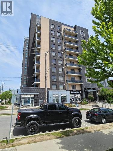 View of building exterior - 8 Hickory Street W Unit# 401, Waterloo, ON - Outdoor With Balcony With Facade