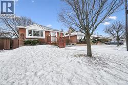 View of front of house with brick siding - 
