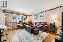 Living area with light wood finished floors - 