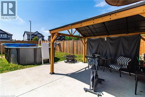 39 Basswood Road, Simcoe, ON - Outdoor With Above Ground Pool