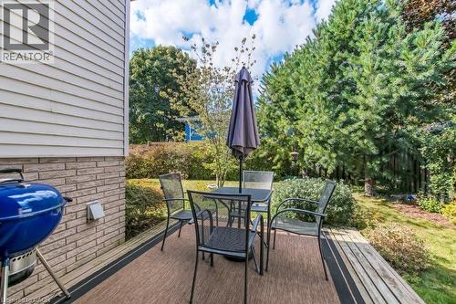 View of patio featuring outdoor dining area and area for grilling - 2 Falls Crescent, Simcoe, ON - Outdoor
