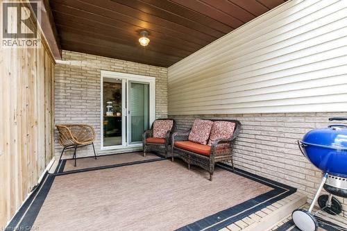 Wooden deck featuring a grill and a patio area - 2 Falls Crescent, Simcoe, ON - Outdoor With Deck Patio Veranda With Exterior