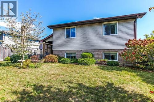Back of house featuring brick siding - 2 Falls Crescent, Simcoe, ON - Outdoor