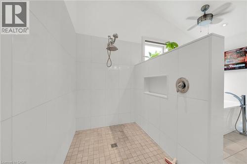Bathroom with a tile shower, ceiling fan, light tile patterned floors, and a freestanding tub - 404 Mountain Brow Boulevard E, Hamilton, ON - Indoor