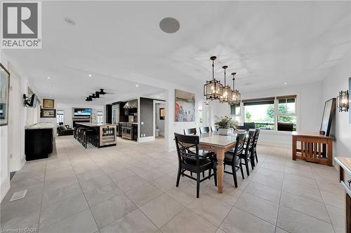Dining area featuring light tile patterned flooring, recessed lighting, and wine cooler - 404 Mountain Brow Boulevard E, Hamilton, ON - Indoor Photo Showing Dining Room