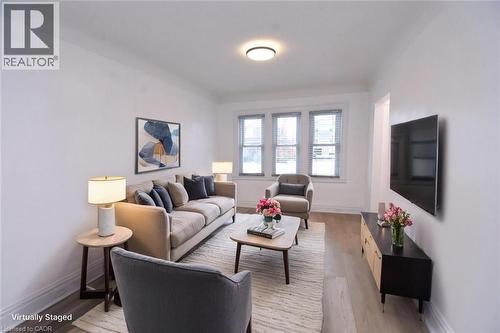 Living area staged - 215 Walter Avenue S, Hamilton, ON - Indoor Photo Showing Living Room