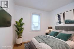 Bedroom staged with baseboards - 