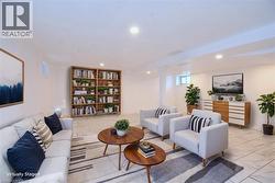 Recreation room staged featuring recessed lighting and light tile patterned flooring - 