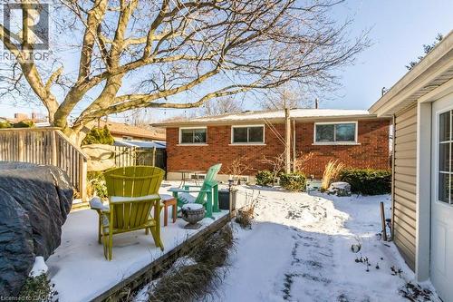 Snow covered patio featuring a patio area - 22 Redwing Road, Hamilton, ON - Outdoor