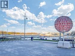 View of property's community featuring a water view - 