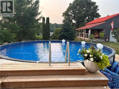 657 Windham Road 14, Simcoe, ON - Outdoor With Above Ground Pool
