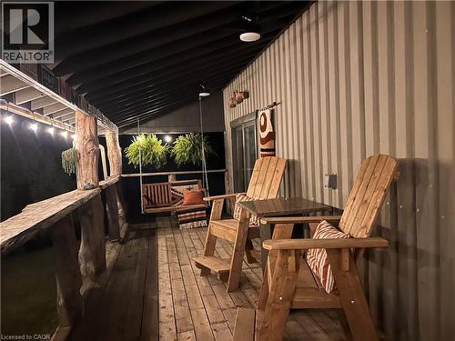 off side of workshop ""sunset deck"" - 657 Windham Road 14, Simcoe, ON - Outdoor With Deck Patio Veranda With Exterior