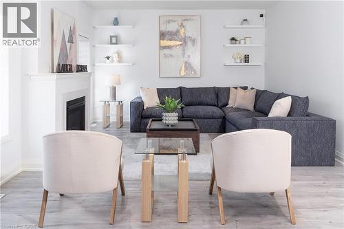 388 Klein Circle, Ancaster, ON - Indoor Photo Showing Living Room With Fireplace