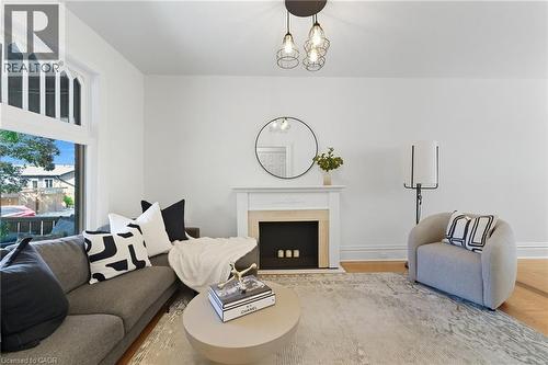 13 Bruce Street, Hamilton, ON - Indoor Photo Showing Living Room With Fireplace