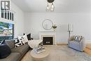 13 Bruce Street, Hamilton, ON  - Indoor Photo Showing Living Room With Fireplace 