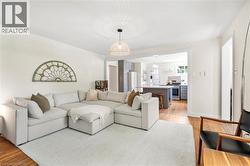 Living area featuring light wood-style floors - 